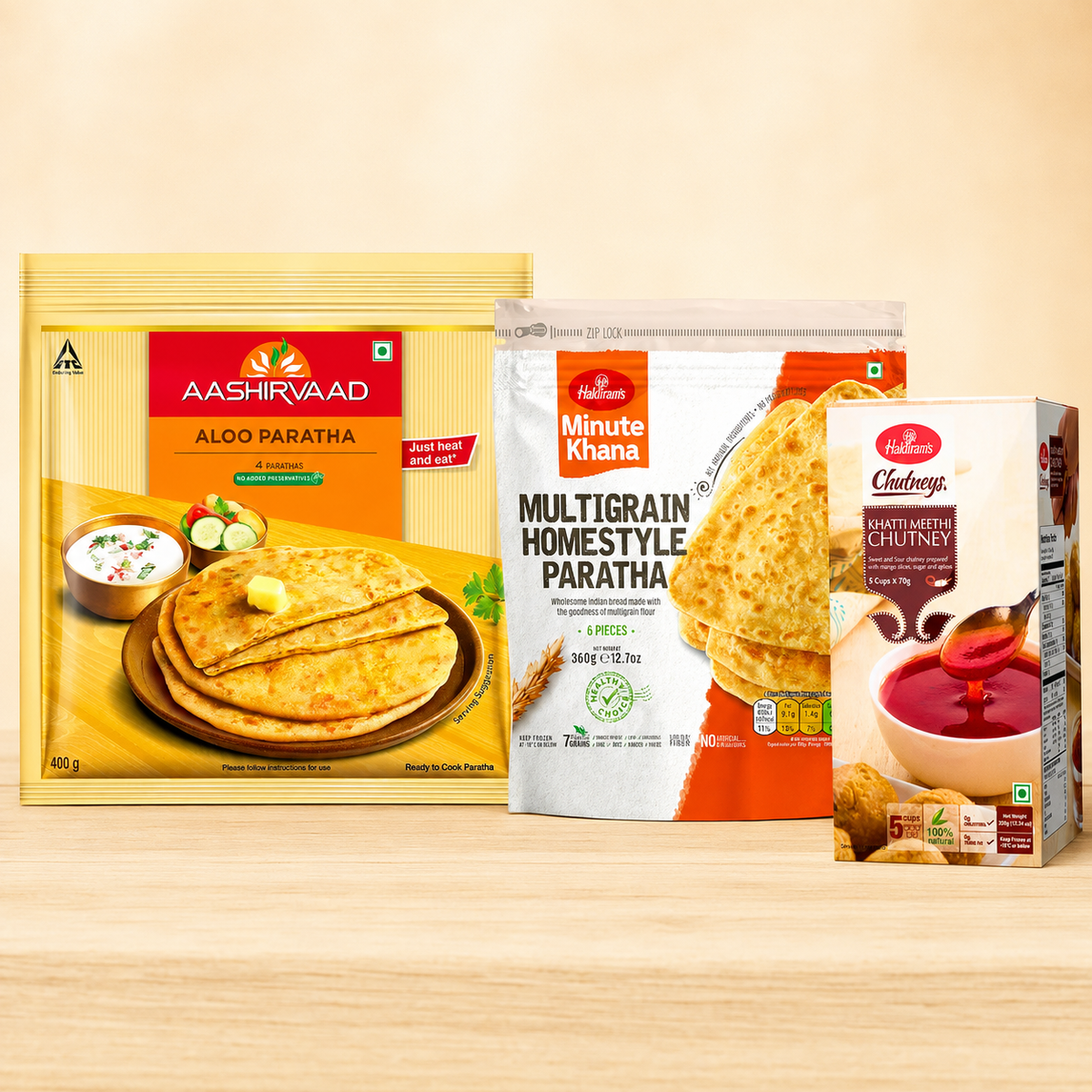 Frozen paratha: Paratha and Chutney Freezer Pack with Aashirvaad Frozen Aloo Paratha 400g, Haldirams Frozen Homestyle Multigrain Paratha 360g and Haldirams Frozen Khatti Meethi Chutney 70g