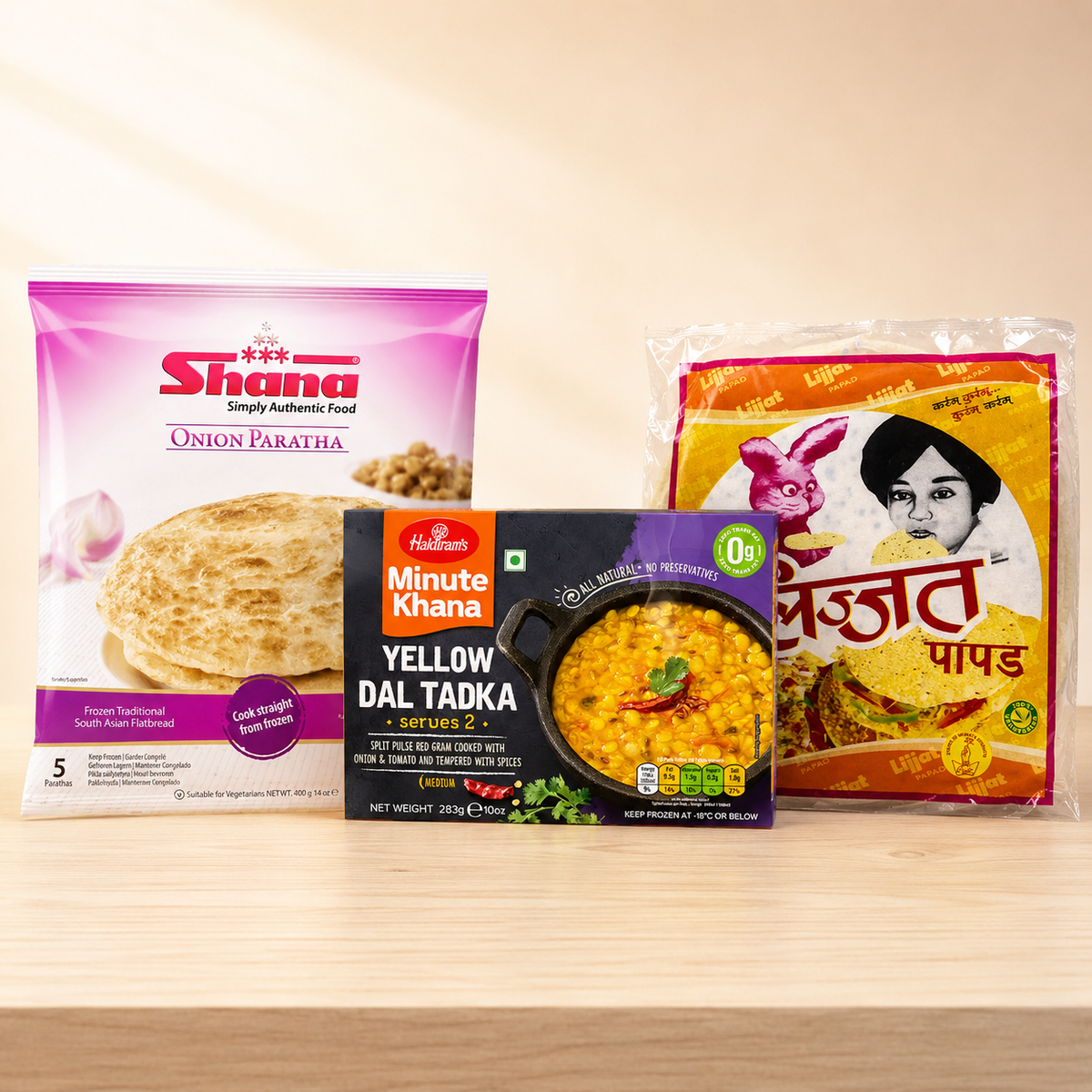 Frozen paratha: Onion Paratha and Dal Tadka Dinner with Shana Frozen Onion Paratha 5pcs, Haldirams Frozen Yellow Dal Tadka 283g and Lijjat Black Pepper Papad 200g