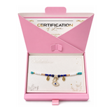 Elegance in Every Knot Rakhi by Adyaani — front view showing product label and branding, studio product photo on white background